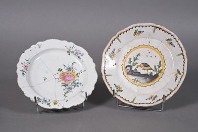 pair of porcelain plates with flowers and birds on them