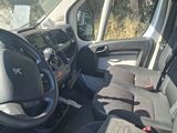 a view of the inside of a vehicle with the driver ' s seat up
