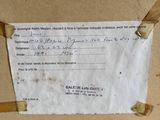 a piece of paper taped to a piece of cardboard