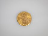 an image of a gold coin on a white surface