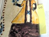 a book with a drawing of a woman holding a bird