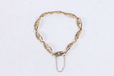 Bracelet en or jaune 750 ‰ à maille filigranée, avec chainet… - Photo 1