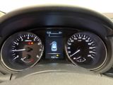 the dashboard of a car with two speedometers and a steering wheel