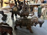 a table with a lot of figurines on top of it