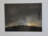 an image of a black and white photo of a full moon in the sky