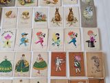 a lot of cards with pictures of people on them