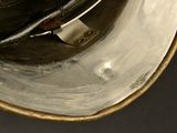 a close up view of a hat on top of a bowl