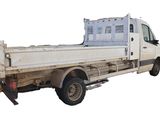a white truck that is parked on the side of the road