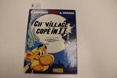 un livre posé sur la table, sur lequel figure l'image d'un personnage de dessin animé