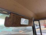 a view of a car ' s rear view mirror from the inside