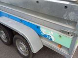 an image of a truck with a trailer attached to it ' s side
