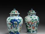 pair of chinese vases with figures on them