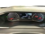 the dashboard of a car with a digital display on it