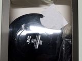 a black box with a pair of headphones inside of it