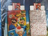 a package of mario bros stationerys on the table