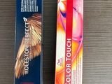 two boxes of hair color sitting on a table next to each other