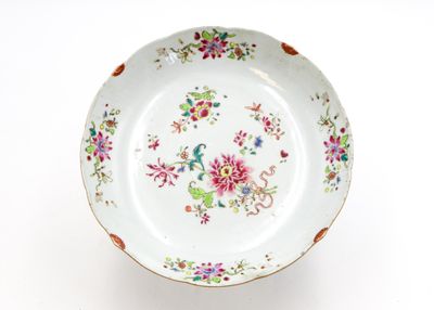 a white plate with a colorful floral design on it