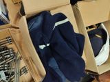 a box full of shoes and a pair of socks in it