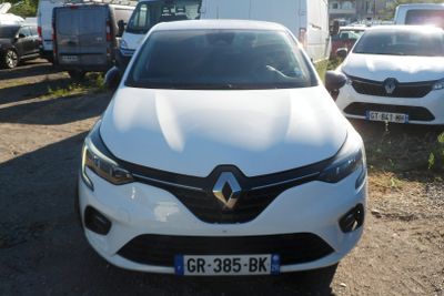 a white car that is parked in a lot