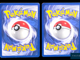 two pokemon cards with a red and white ball on them