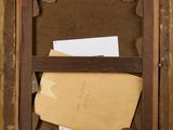 a picture of an old wooden box with a letter in it