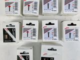 six boxes of assorted electronic gadgets are sitting on a white surface