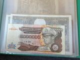 a picture of a paper money in a clear box