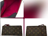a close up of a purse with a zipper on top of it