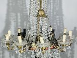 an image of a chandelier made of glass and metal