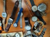 a lot of watches and watches on a table