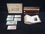 a box with a lot of money in it on a table