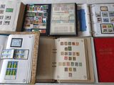 many different types of stamps on the pages of a book