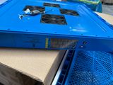 a blue box with a fan on top of it