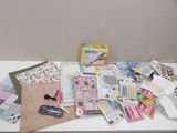 a table that has a lot of crafting supplies on it