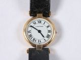 an image of a wrist watch with roman numerals