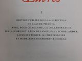 the front cover of a book with red writing on it