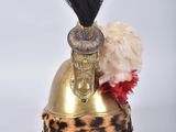 an image of a helmet with a feather on top of it