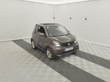 a small car that is parked in a garage
