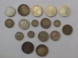 a lot of coins that are on the table