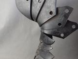 a metal sculpture of a flower made out of metal