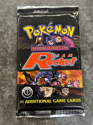 a close up of a pokemon trading card game packet on a table