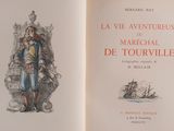 an open book with a picture of a man on it