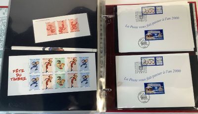 four different stamps in a binder on a table