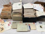 a box full of mail sitting on top of a table