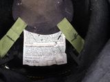 a close up of a black hat with a label on it