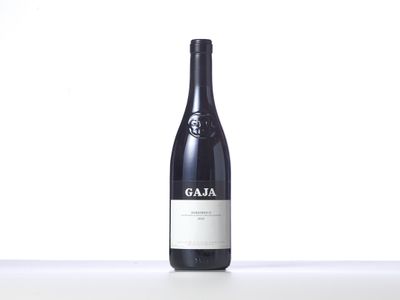 a bottle of wine that is sitting on a table