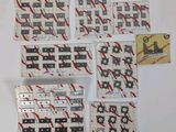 six pieces of tape on a white surface with red and black lines