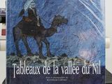 a picture of a book with a picture of a man riding a camel