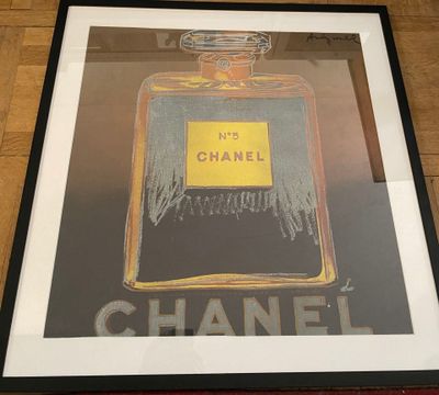 chanel no 5 framed art print in a black frame