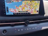the dashboard of a car with a gps device on the dash